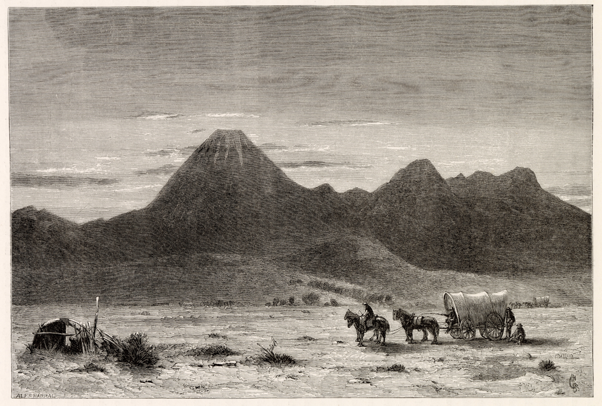 An engraving of a covered wagon and riders halted on a desert plain beneath a tall, cone-shaped mountain.